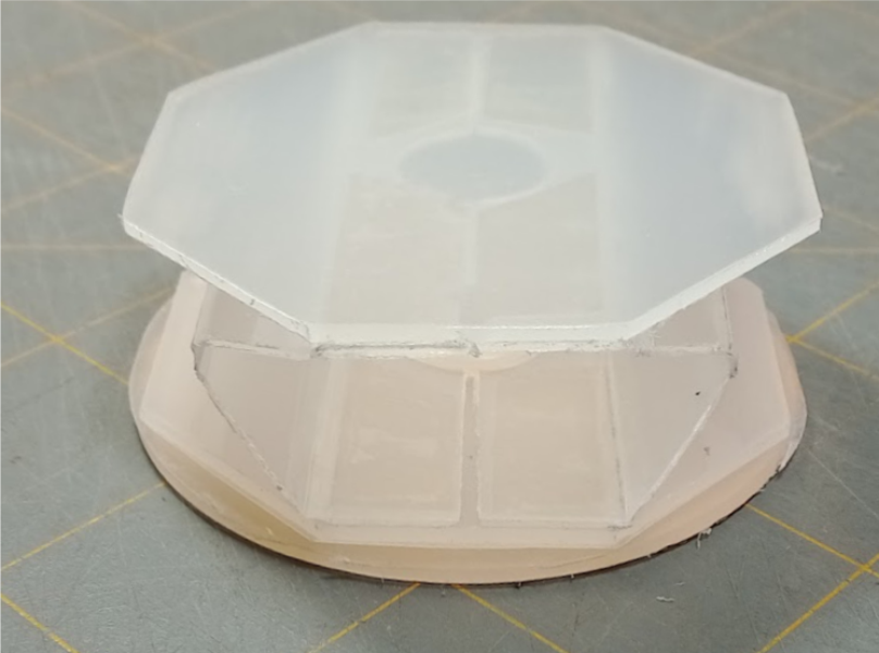 Early prototypes were constructed from cardboard and flexible plastic